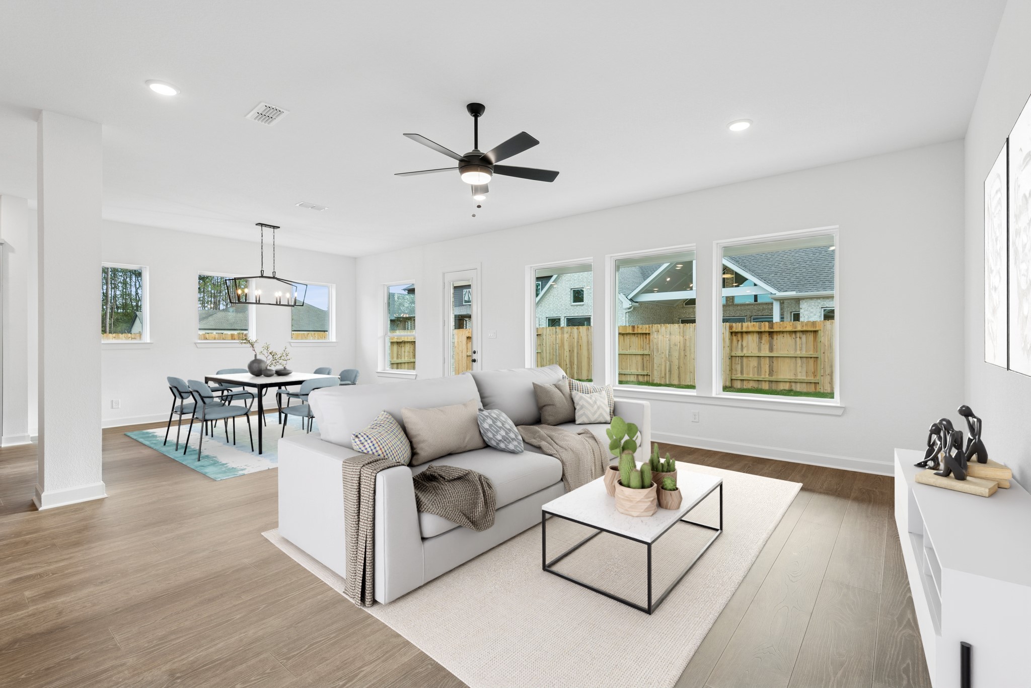 15714 Terracotta Terrace Lane Conroe, TX 77302 - Photo 5 of 47 a living room with furniture and a large window