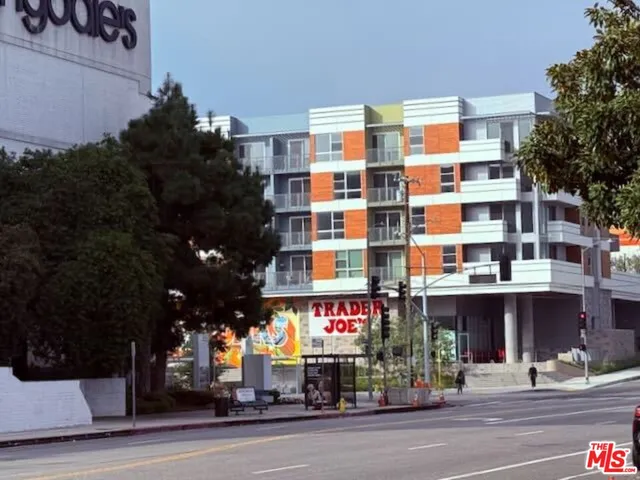 a view of a building and a street