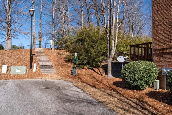 a view of a backyard of the house
