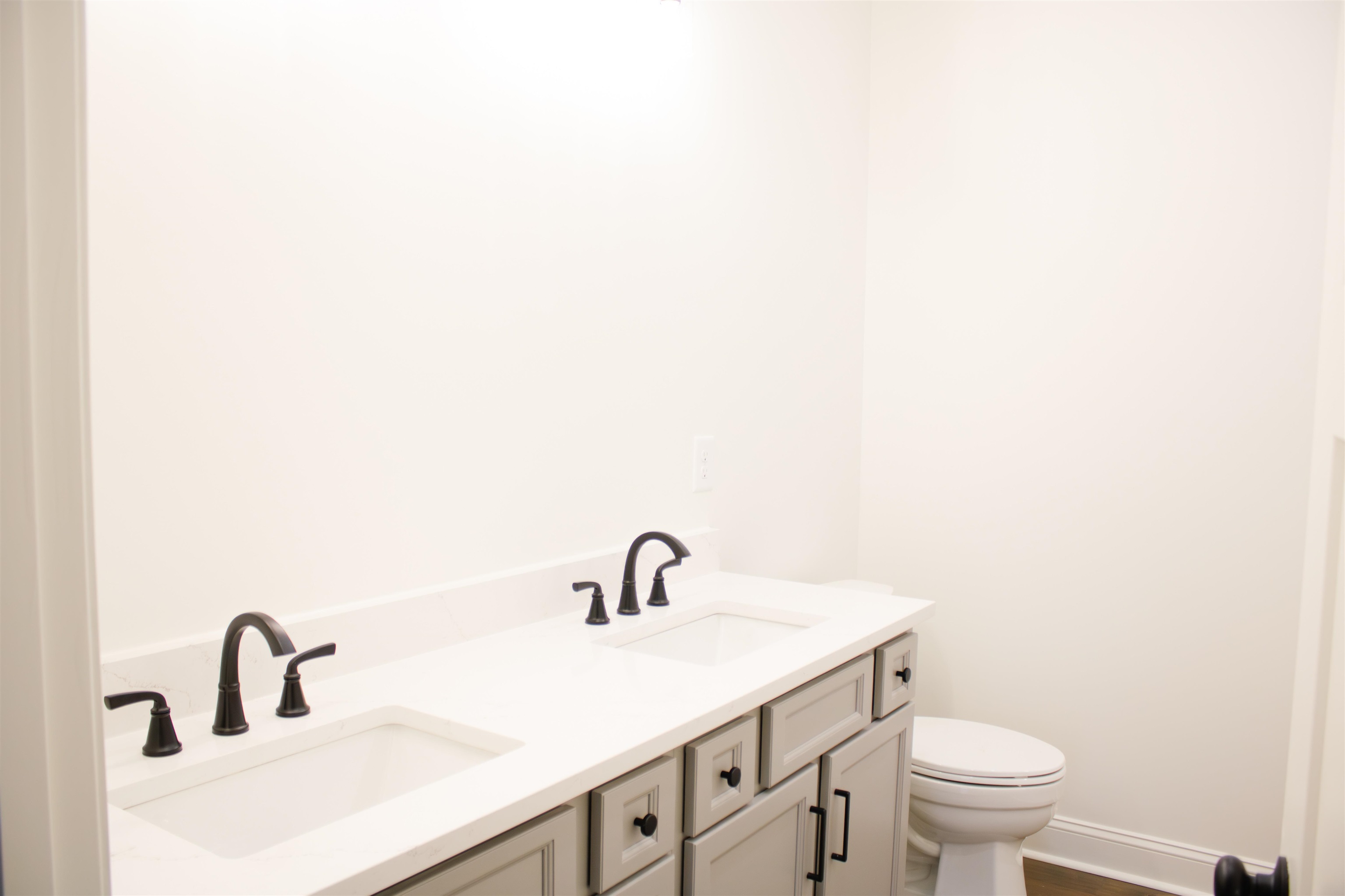 261 Oakgrove Road Selmer, TN 38375 - Photo 13 of 15 a bathroom with a sink and a toilet