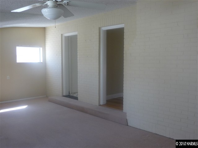 1135 Mt Rose Street Reno, NV 89509 - Photo 7 of 7 an empty room with a window