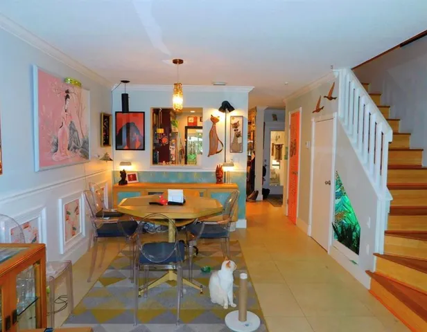 a room with furniture and a rug