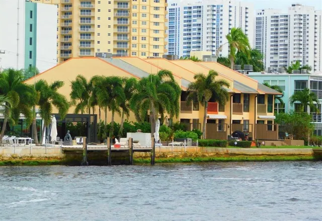 a view of a building with a swimming pool