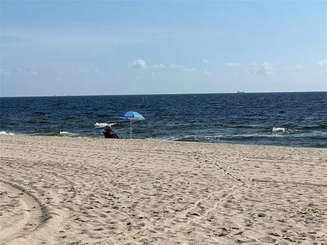 a view of a swimming pool and an ocean view