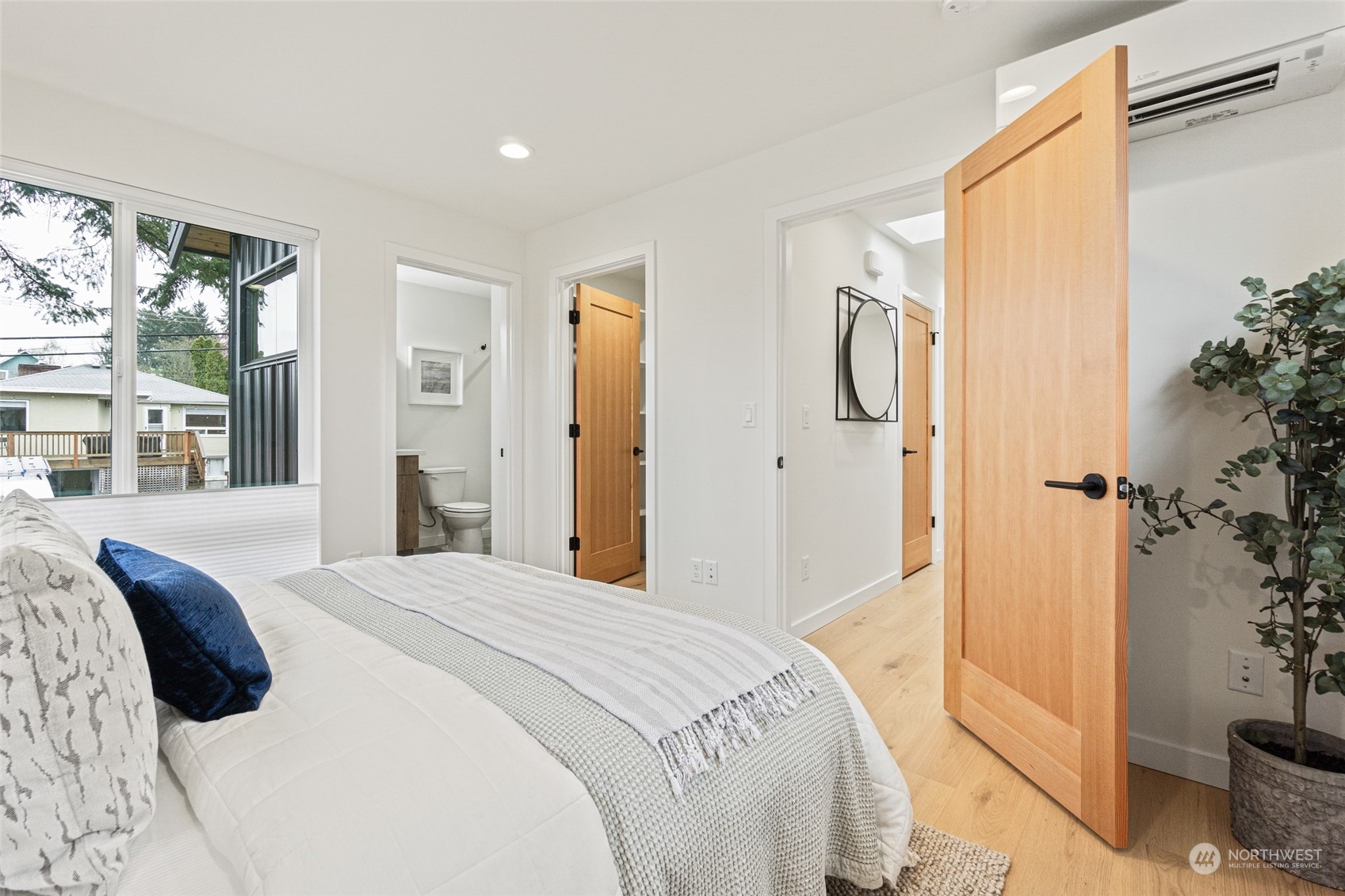 4256 33rd Avenue West Seattle, WA 98199 - Photo 13 of 24 a bedroom with a bed and a window