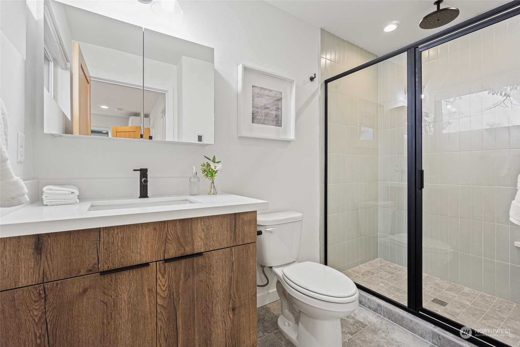 4256 33rd Avenue West Seattle, WA 98199 - Photo 21 of 24 a bathroom with a sink toilet and shower
