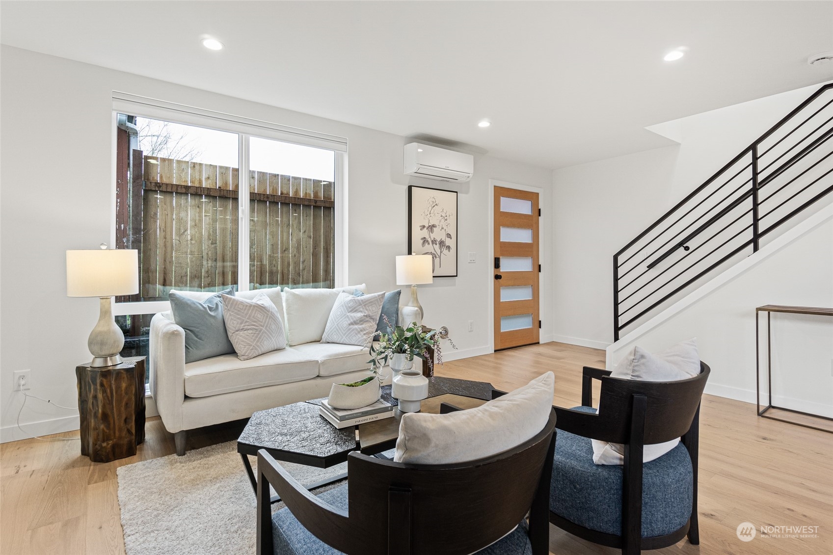 4256 33rd Avenue West Seattle, WA 98199 - Photo 5 of 24 a living room with furniture and a large window
