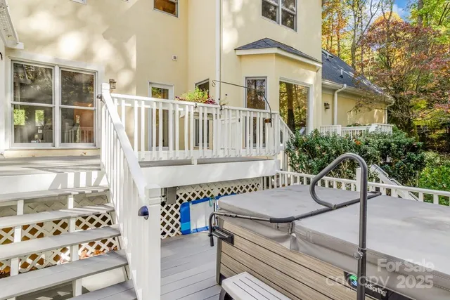 a view of a chair and table in the balcony