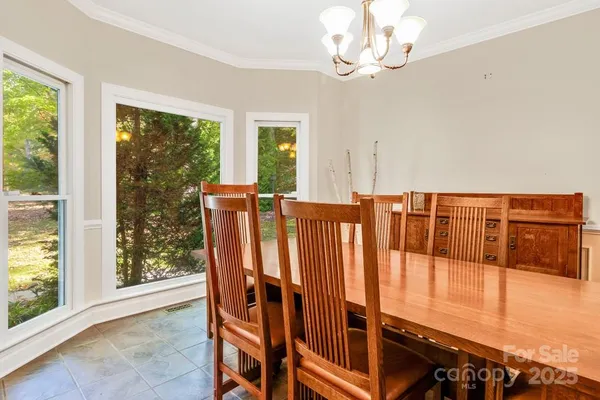 a view of a room with balcony and furniture