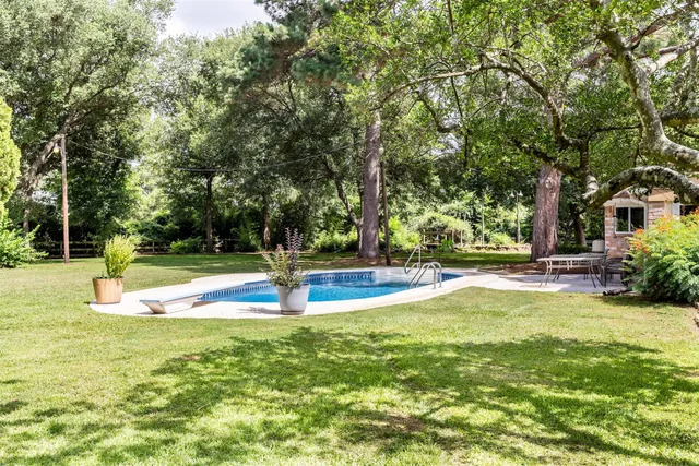 a view of a swimming pool with an outdoor space