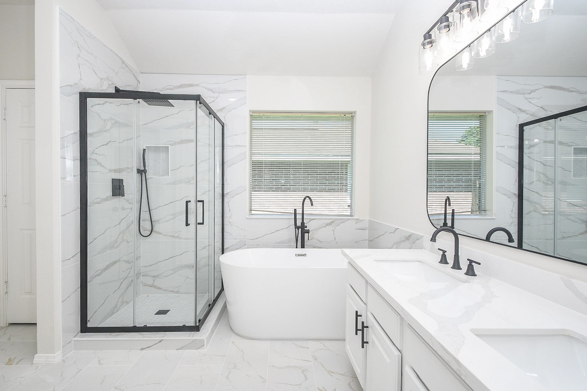 4810 Arbor Court Rosenberg, TX 77471 - Photo 15 of 20 a bathroom with a double vanity sink mirror and shower