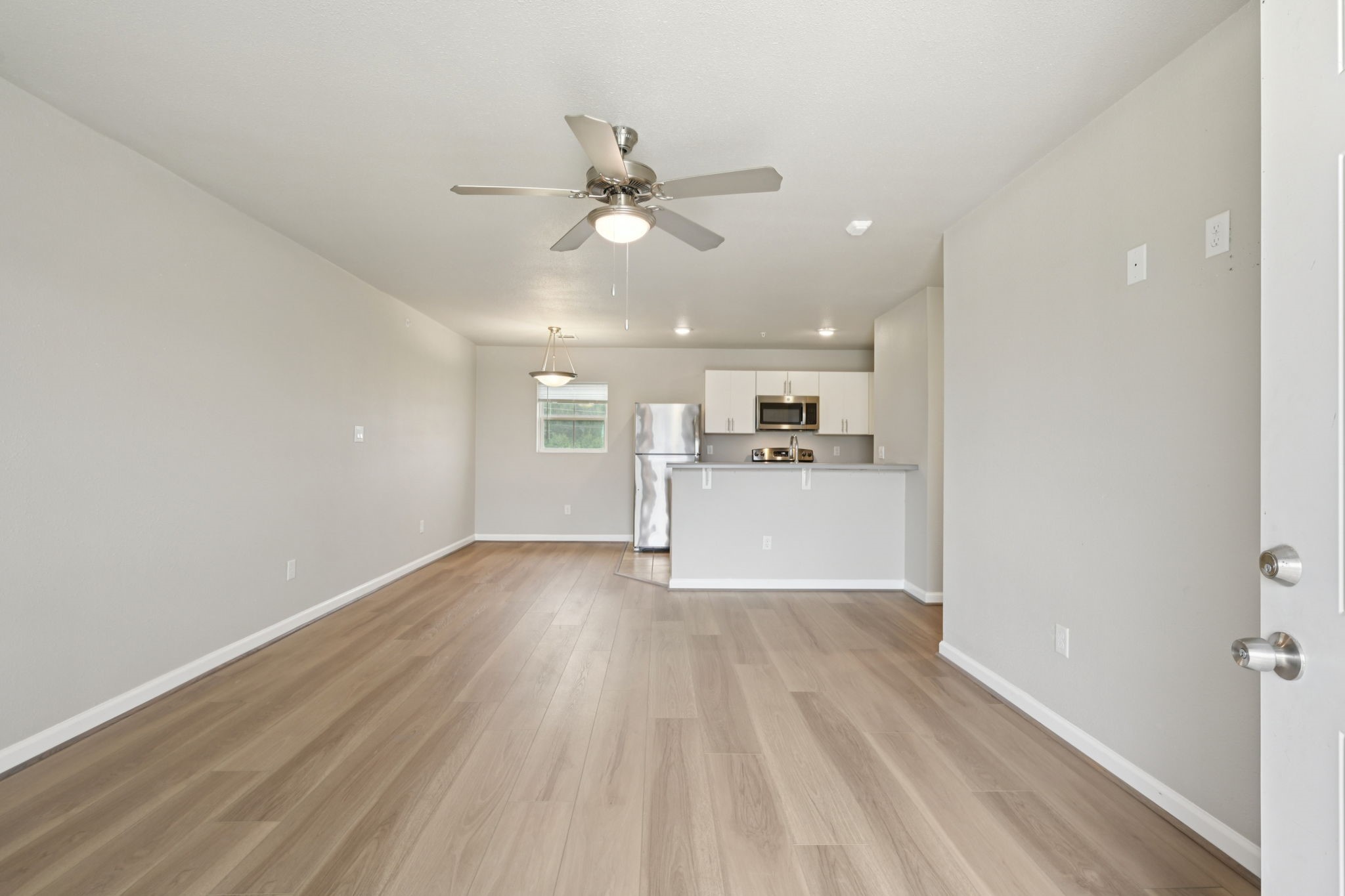 254 Plez Morgan Drive, Unit F Montgomery, TX 77356 - Photo 6 of 31 a view of a kitchen with a sink and a window