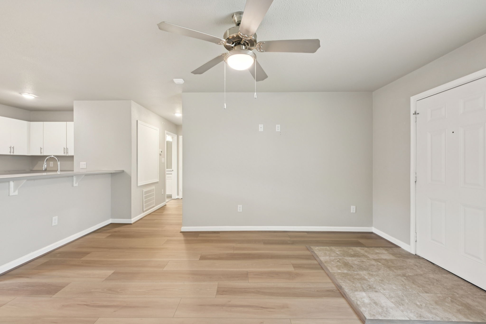 254 Plez Morgan Drive, Unit F Montgomery, TX 77356 - Photo 9 of 31 a view of an empty room and kitchen view