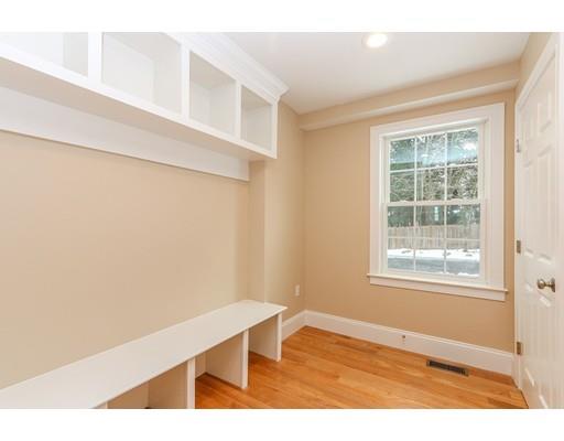 46 Colburn Street Westwood, MA 02090 - Photo 12 of 30 a view of an empty room with wooden floor and a window