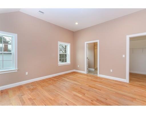 46 Colburn Street Westwood, MA 02090 - Photo 18 of 30 a view of an empty room with window and wooden floor