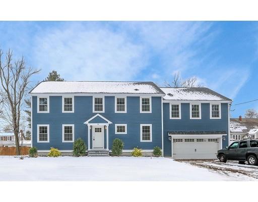 46 Colburn Street Westwood, MA 02090 - Photo 2 of 30 a front view of a house with a yard