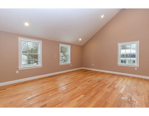 46 Colburn Street Westwood, MA 02090 - Photo 21 of 30 an empty room with wooden floor and windows
