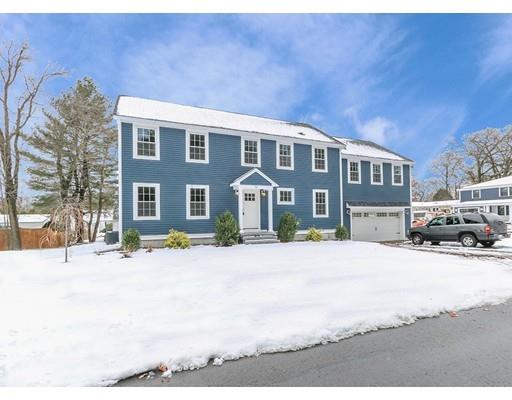 46 Colburn Street Westwood, MA 02090 - Photo 3 of 30 a front view of a house with a yard