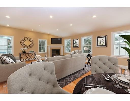 46 Colburn Street Westwood, MA 02090 - Photo 6 of 30 a living room with furniture and a flat screen tv