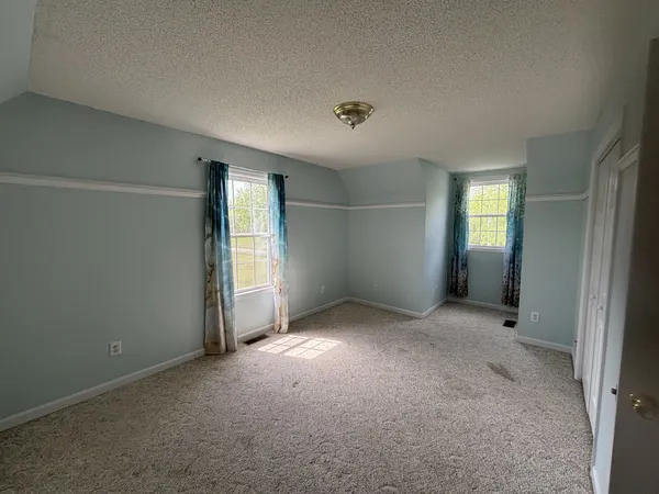 a view of a room next to a large window