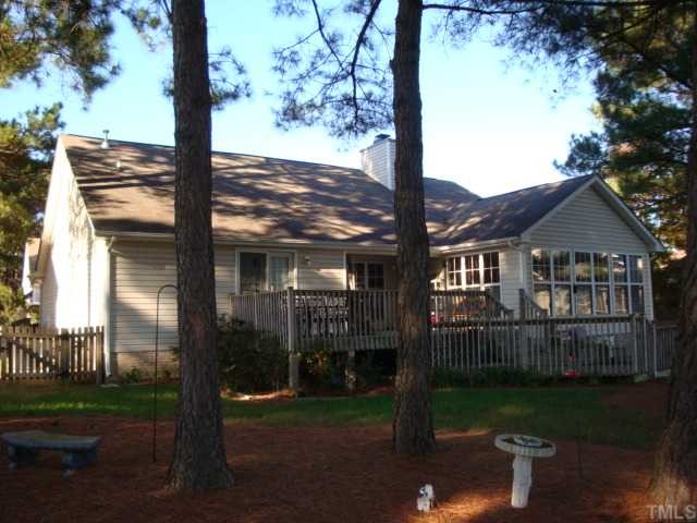 5124 Long Neck Court Raleigh, NC 27604 - Photo 11 of 12 Rear of the home shows the 2 tier deck and wonderful mature shade tree's .