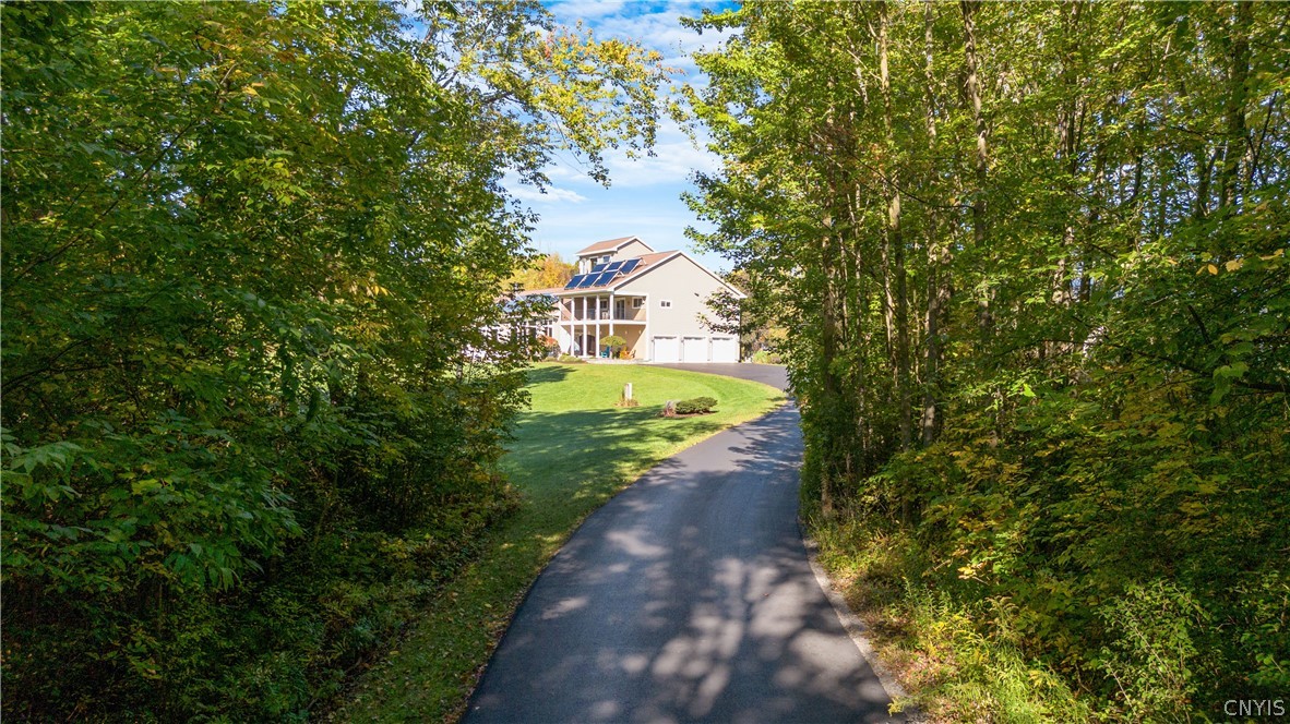 6687 Beach Road Camillus, NY 13209 - Photo 1 of 50 Long drive off Beach Road leads to impressive cust