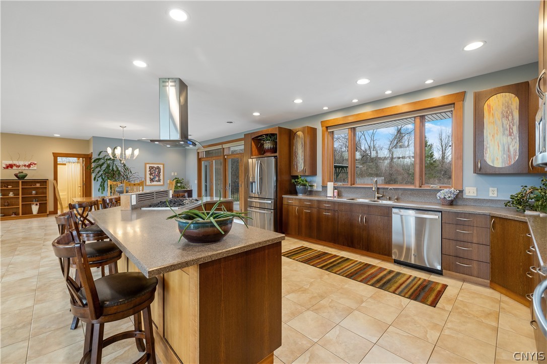 6687 Beach Road Camillus, NY 13209 - Photo 16 of 50 Sink overlooks yard and pool.