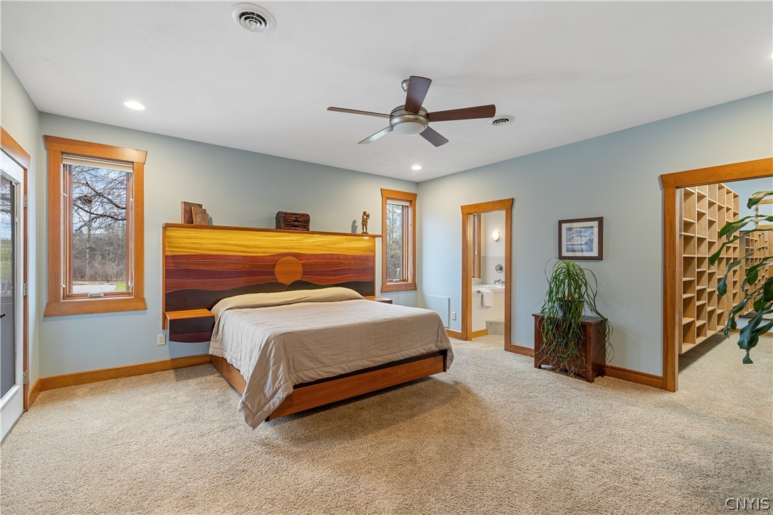 6687 Beach Road Camillus, NY 13209 - Photo 19 of 50 Primary suite offers built in headboard and night