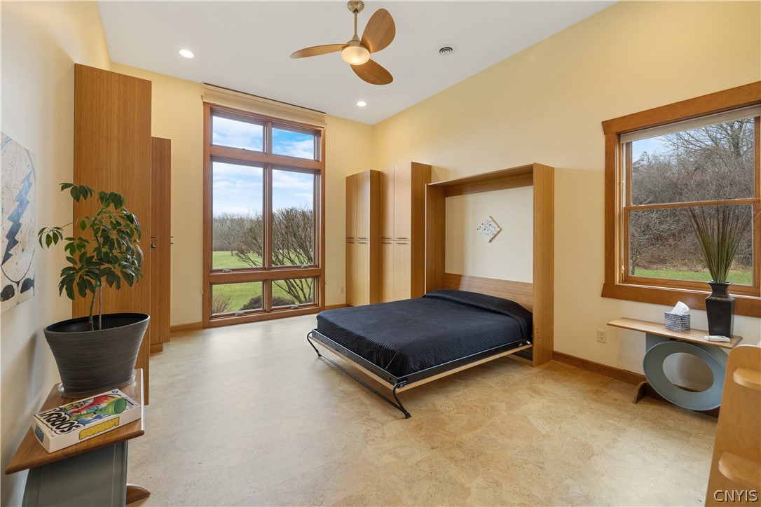 6687 Beach Road Camillus, NY 13209 - Photo 24 of 50 Bedroom #3 has bamboo wardrobes, Murphy bed, and c
