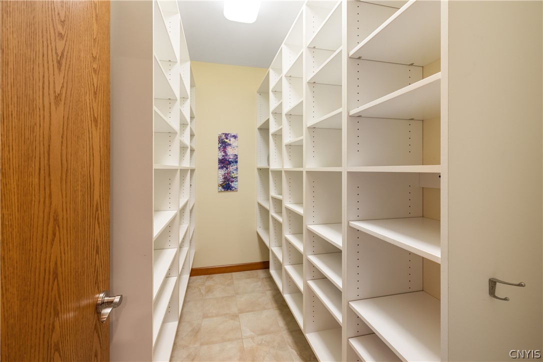 6687 Beach Road Camillus, NY 13209 - Photo 26 of 50 Walk in linen closet.