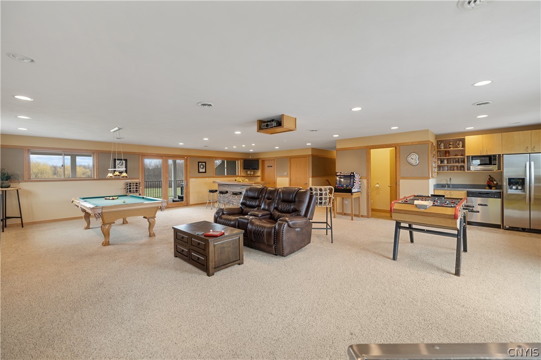 6687 Beach Road Camillus, NY 13209 - Photo 29 of 50 Huge space, with kitchenette, and access to decks