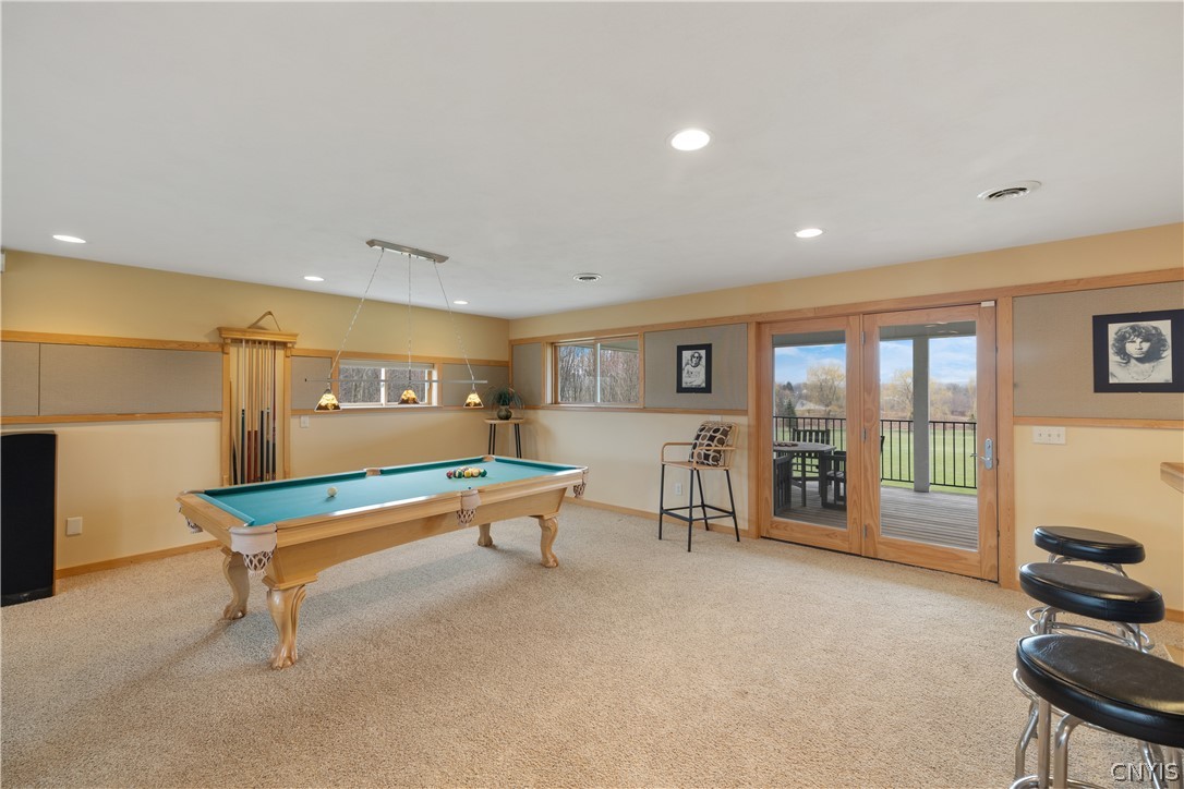 6687 Beach Road Camillus, NY 13209 - Photo 30 of 50 Doors lead to covered deck...