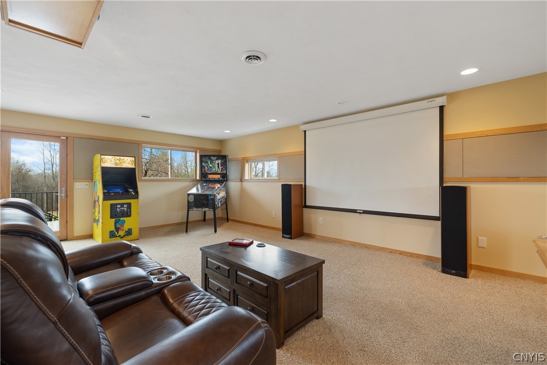 6687 Beach Road Camillus, NY 13209 - Photo 32 of 50 Pull down screen and projector will convey.
