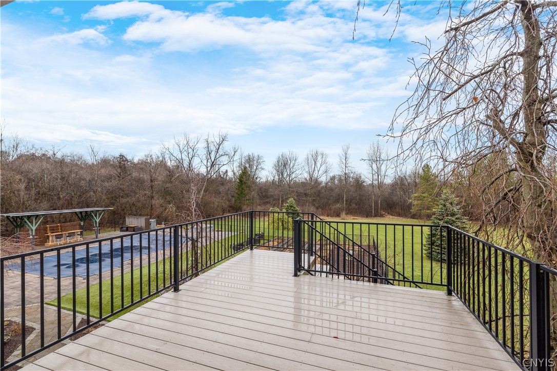 6687 Beach Road Camillus, NY 13209 - Photo 34 of 50 2nd set of doors in game room lead to upper deck o