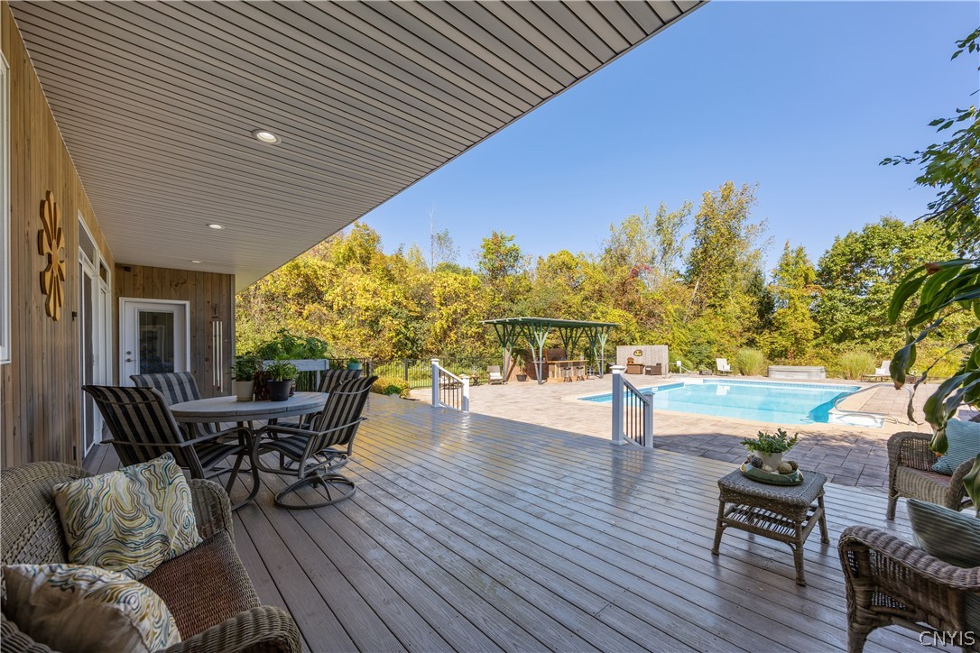 6687 Beach Road Camillus, NY 13209 - Photo 36 of 50 Time to explore the backyard. Covered back deck f