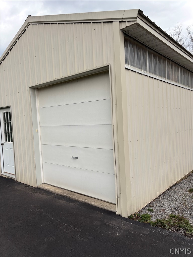 6687 Beach Road Camillus, NY 13209 - Photo 47 of 50 Separate single car garage...great for yard equipm