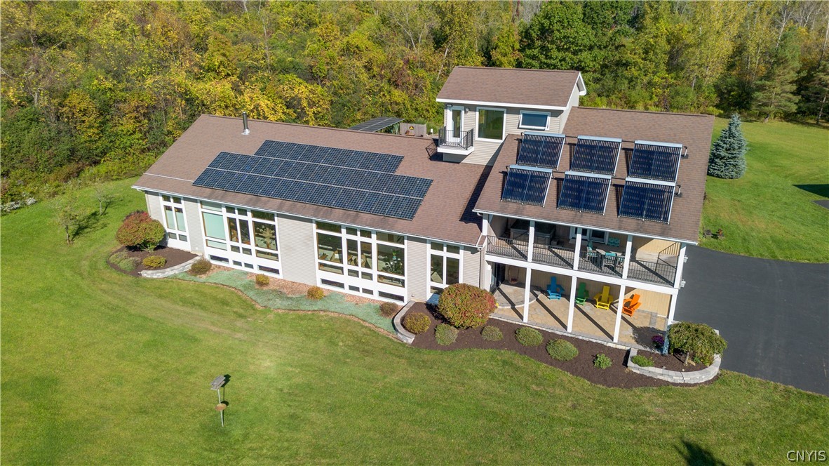 6687 Beach Road Camillus, NY 13209 - Photo 5 of 50 Panels to left supplement electric service, glass