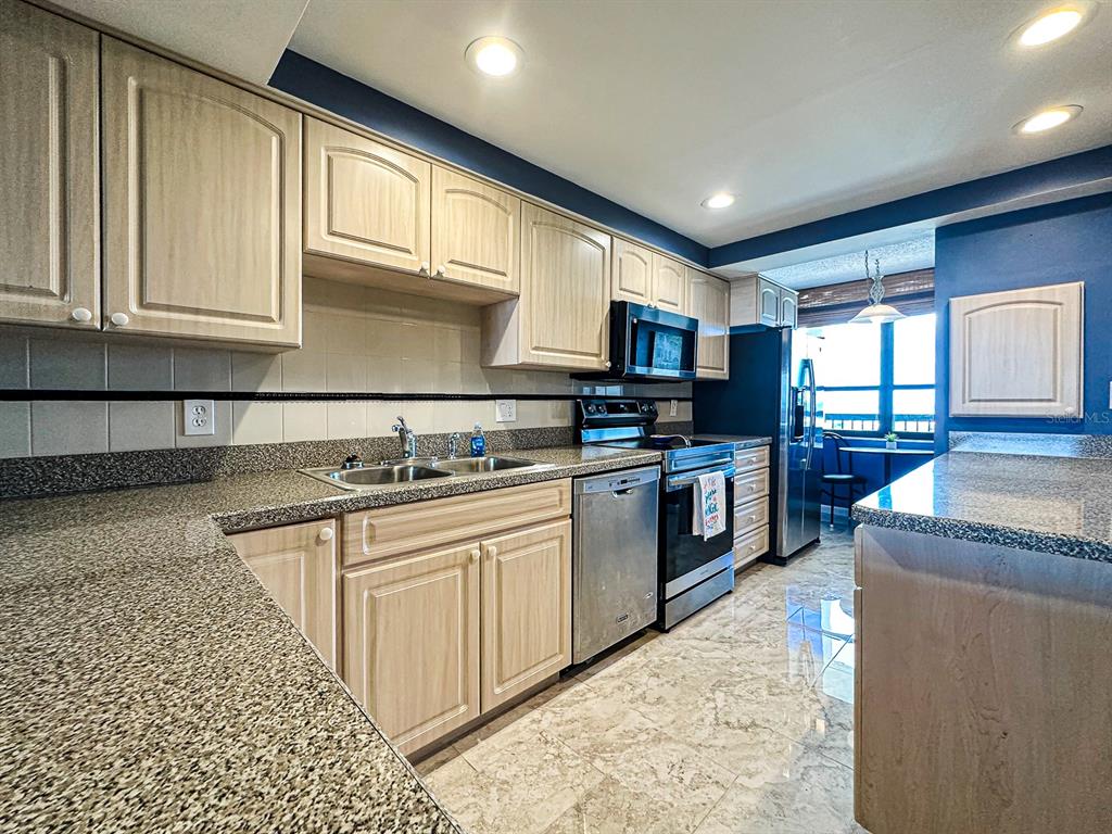 9415 Blind Pass Road, Unit 1002 St. Pete Beach, FL 33706 - Photo 9 of 38