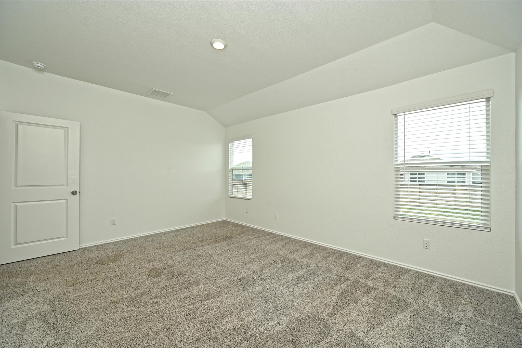 180 Madrid Kyle, TX 78640 - Photo 19 of 32 a view of an empty room with a window