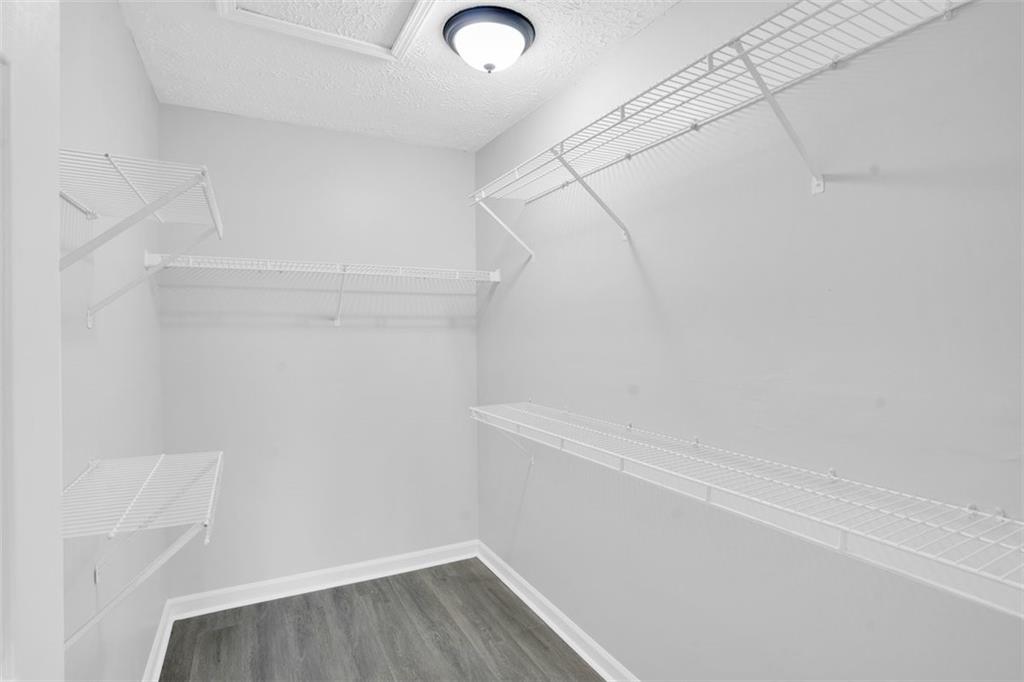 235 Bentley Place Tucker, GA 30084 - Photo 16 of 22 a view of small space with racks on the wall