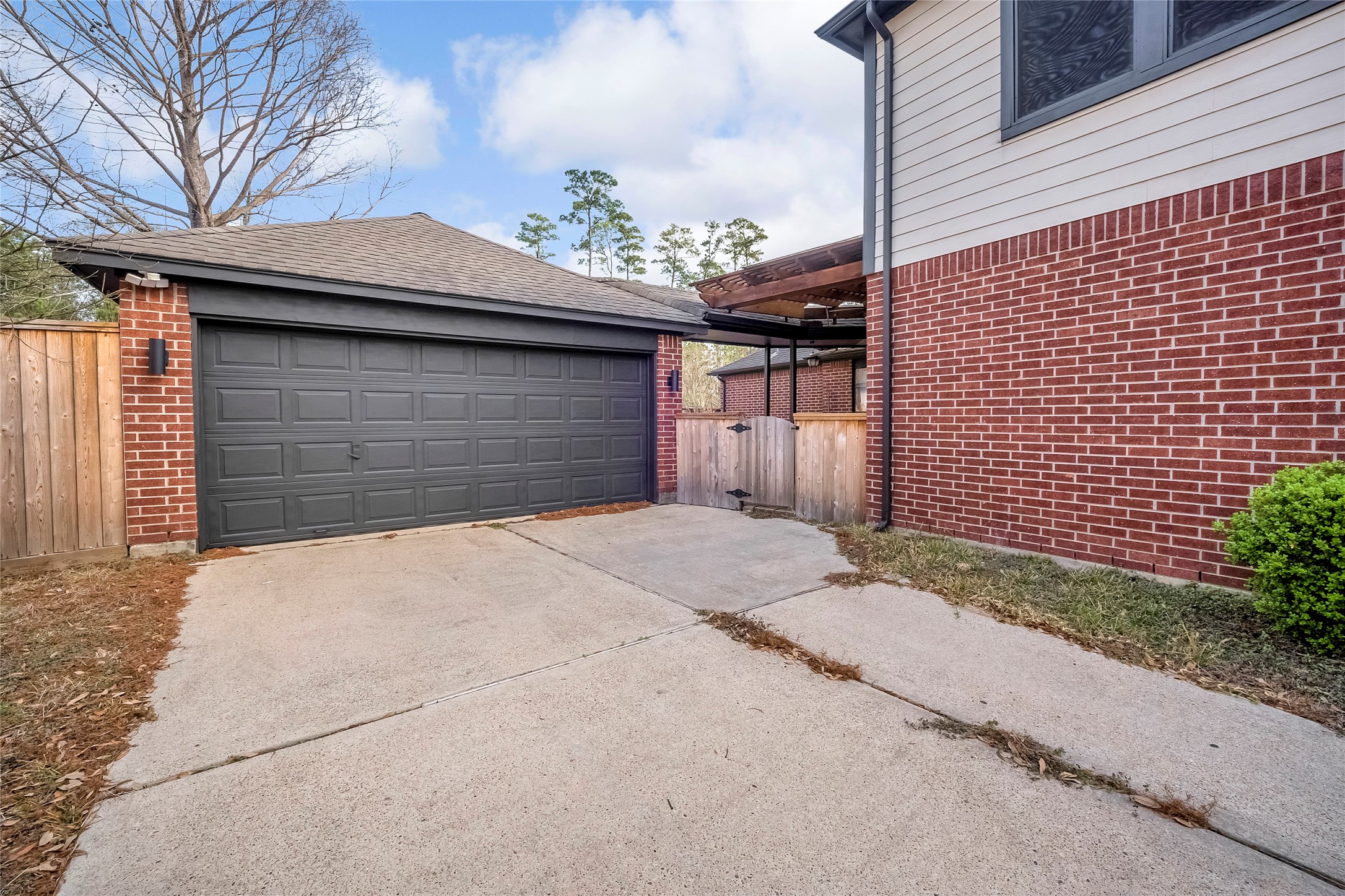 7403 Fall Springs Lane Humble, TX 77396 - Photo 16 of 16 a front view of a house with a garage