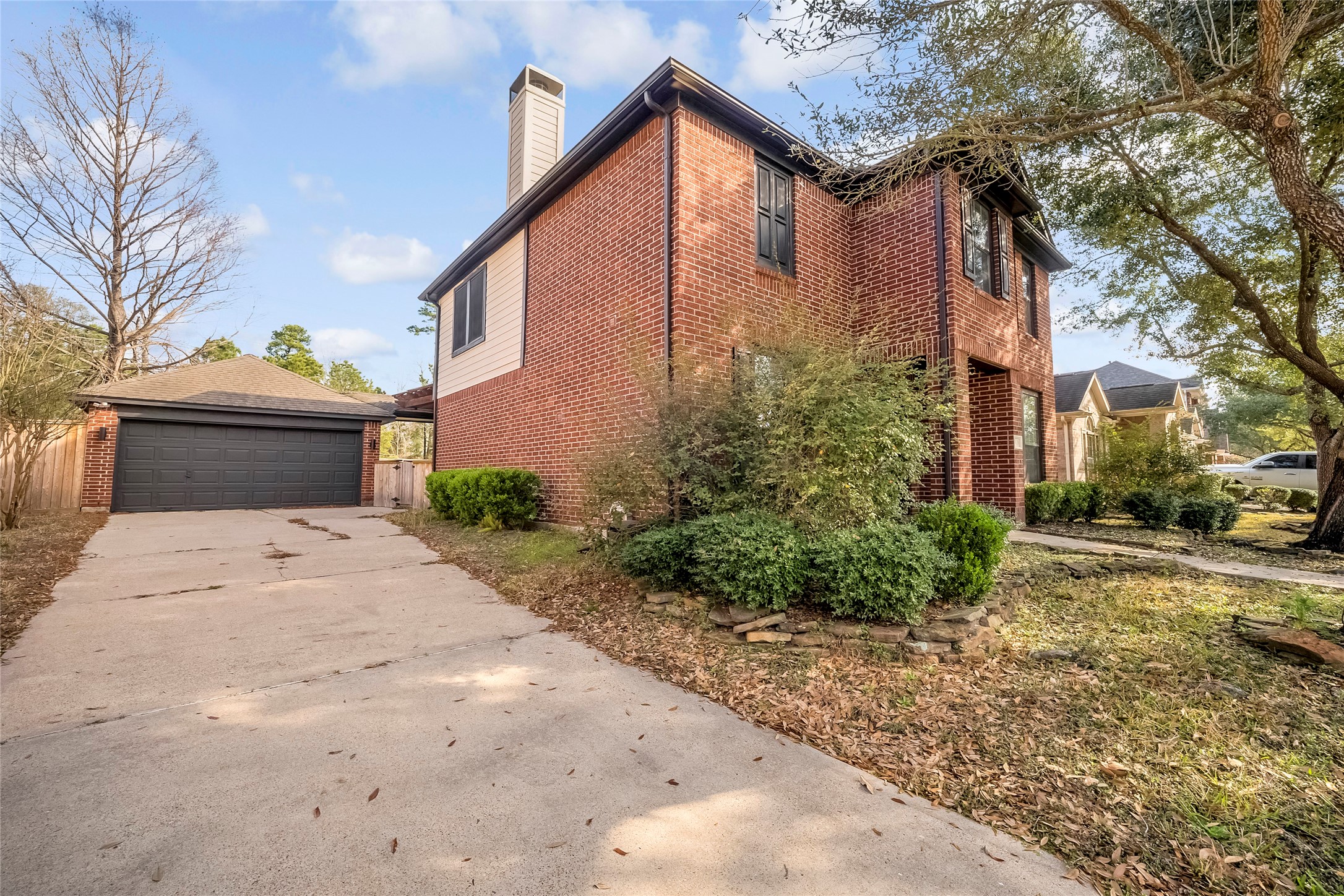 7403 Fall Springs Lane Humble, TX 77396 - Photo 2 of 16 a front view of a house with garden