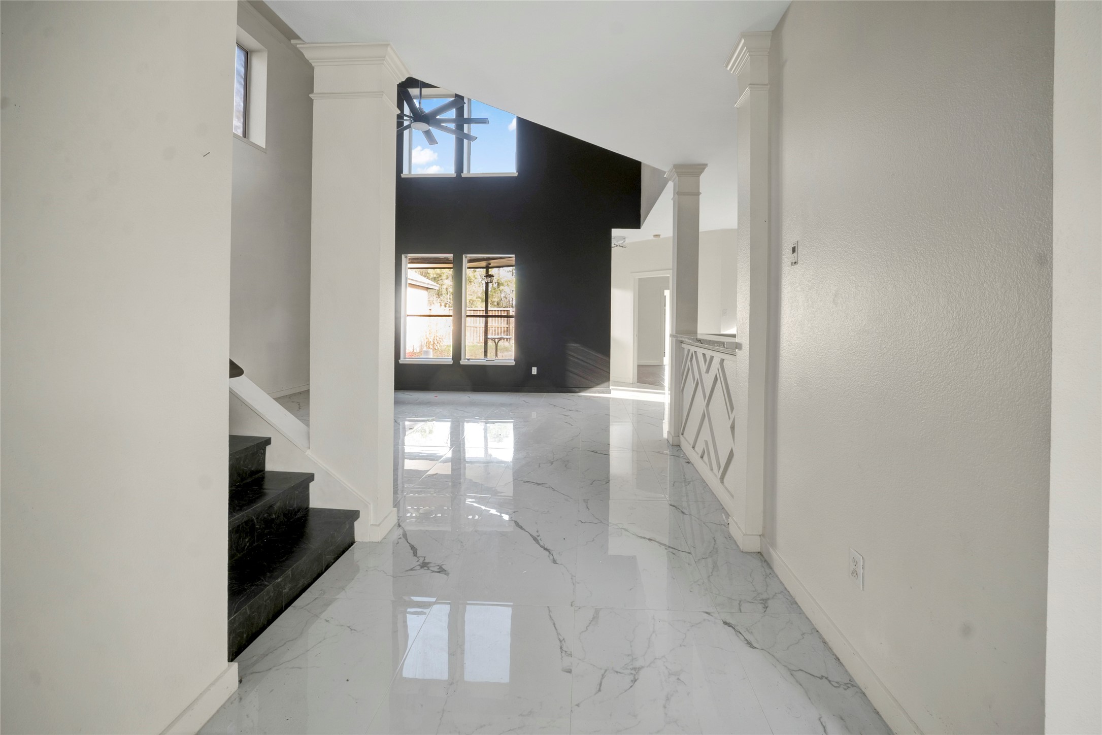 7403 Fall Springs Lane Humble, TX 77396 - Photo 3 of 16 a view interior of a house with wooden floor and a window