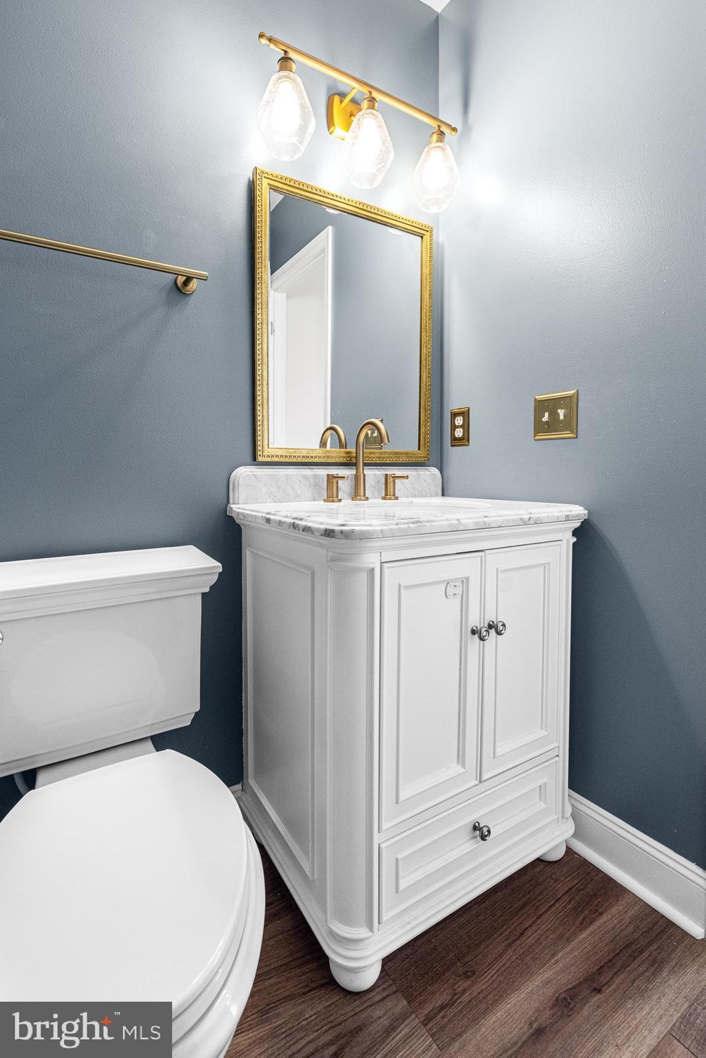 1022 Fawn Haven Walk Dover, DE 19901 - Photo 15 of 46 a bathroom with a granite countertop toilet sink and mirror