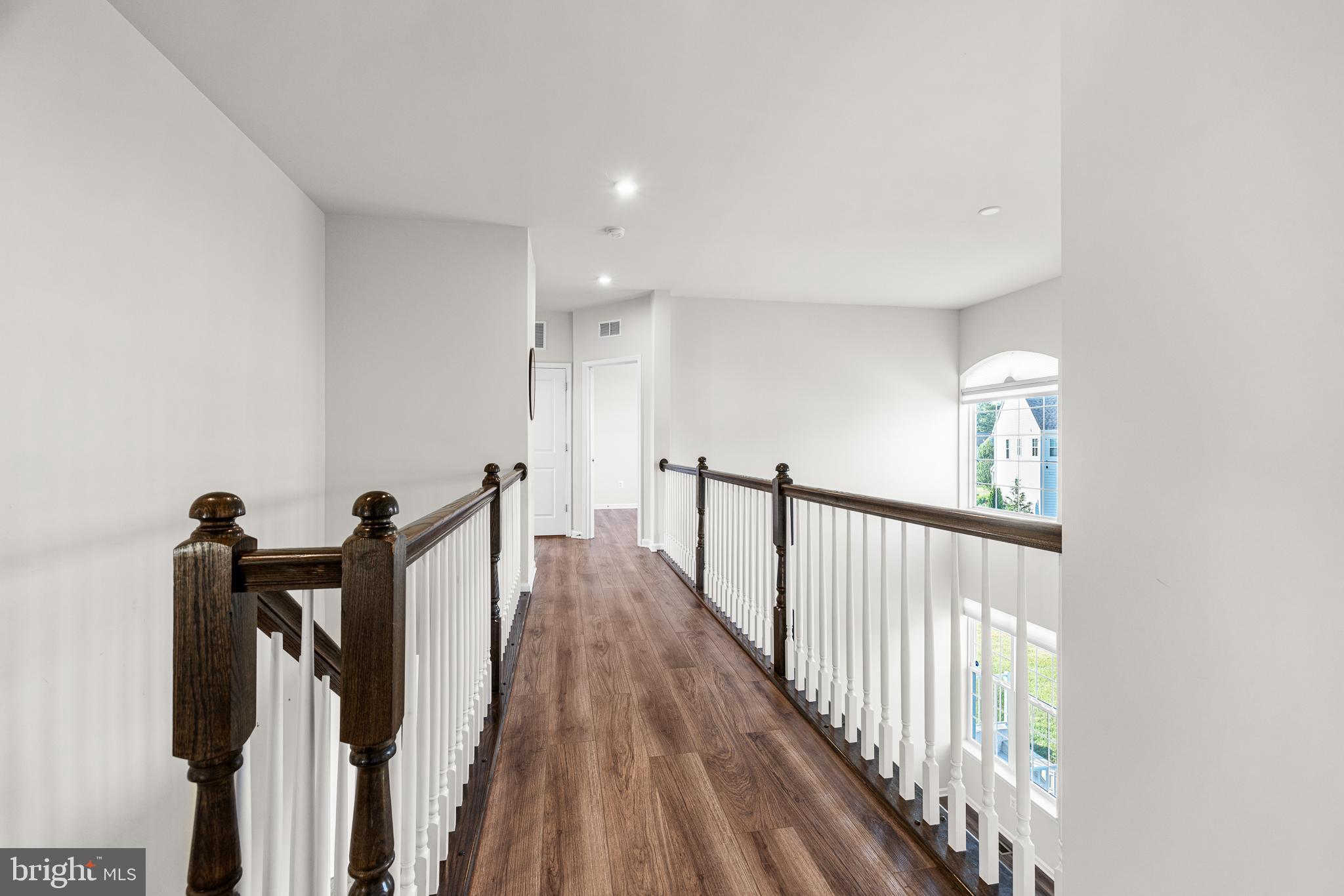 1022 Fawn Haven Walk Dover, DE 19901 - Photo 17 of 46 a view of a hallway with a large window