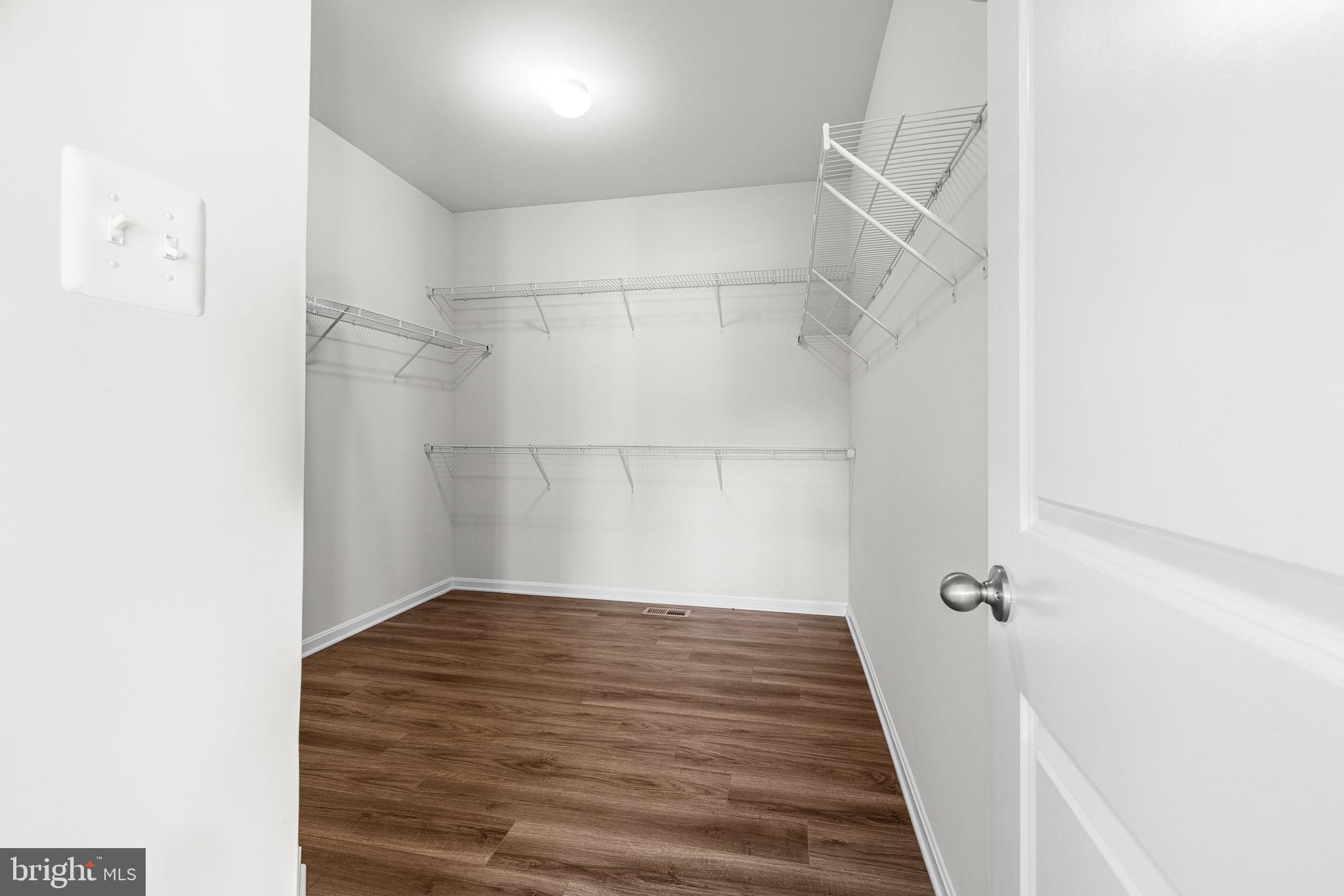 1022 Fawn Haven Walk Dover, DE 19901 - Photo 33 of 46 a view of a room with wooden floor