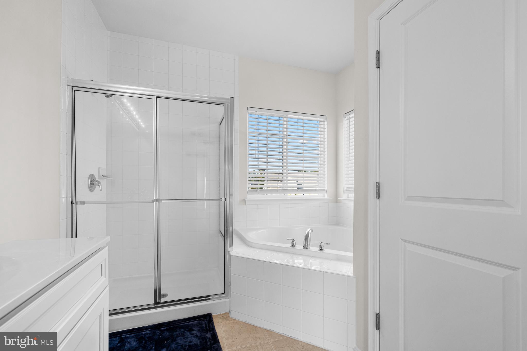 1022 Fawn Haven Walk Dover, DE 19901 - Photo 34 of 46 a bathroom with a bathtub and sink