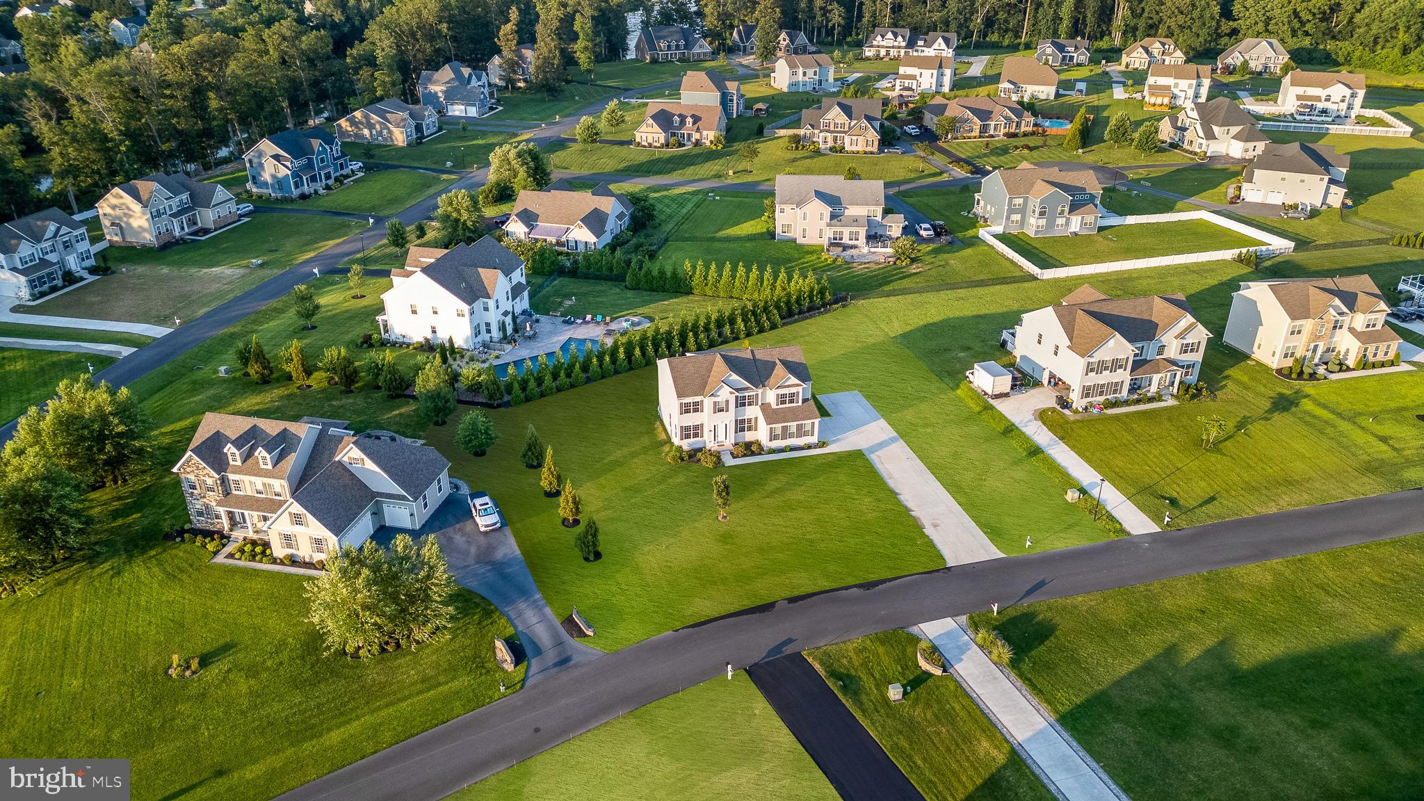 1022 Fawn Haven Walk Dover, DE 19901 - Photo 43 of 46 an aerial view of a tennis ground and a cars park side of the road