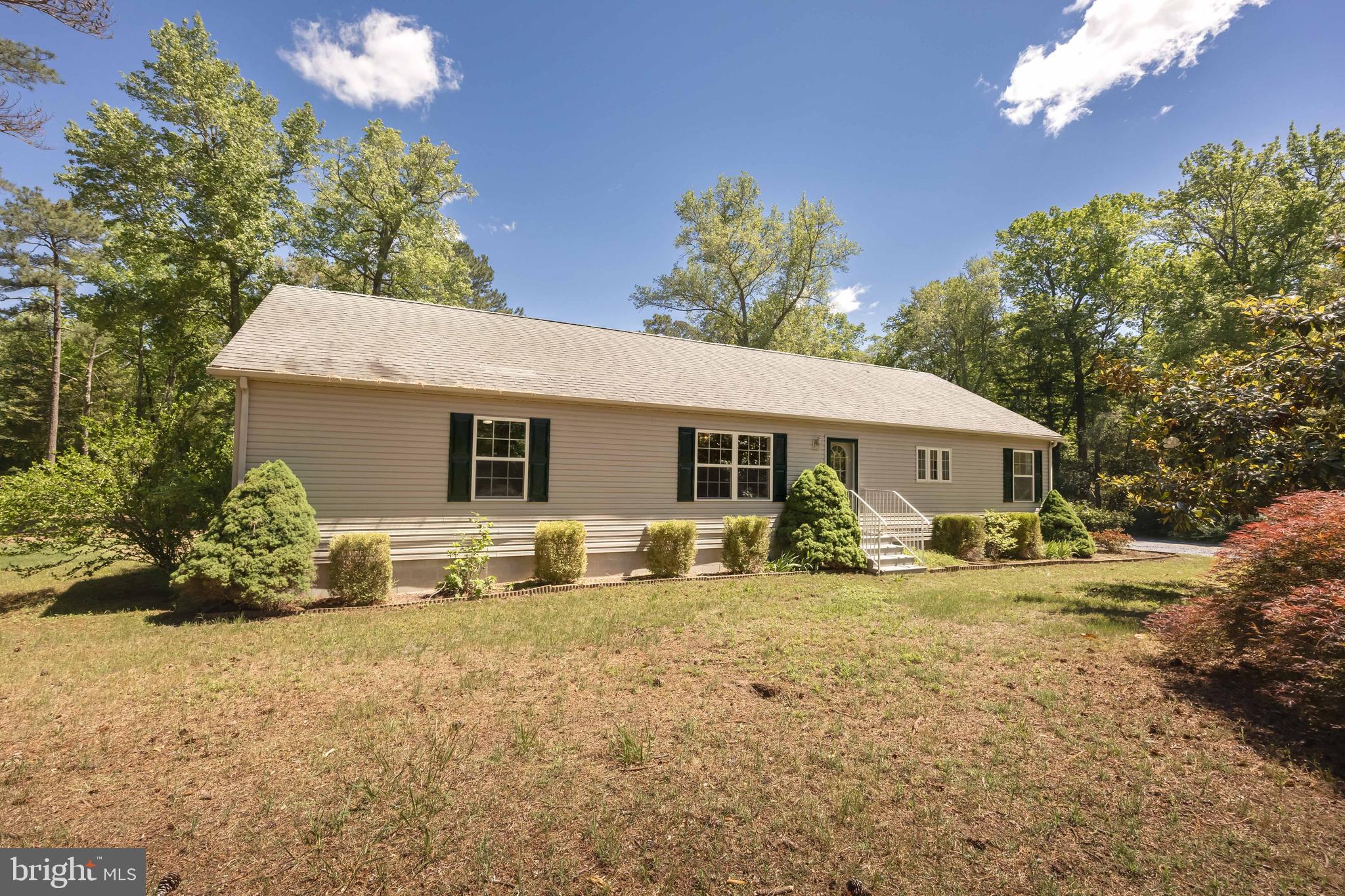 6635 Libertytown Road Berlin, MD 21811 - Photo 56 of 88 a front view of a house with yard and seating area