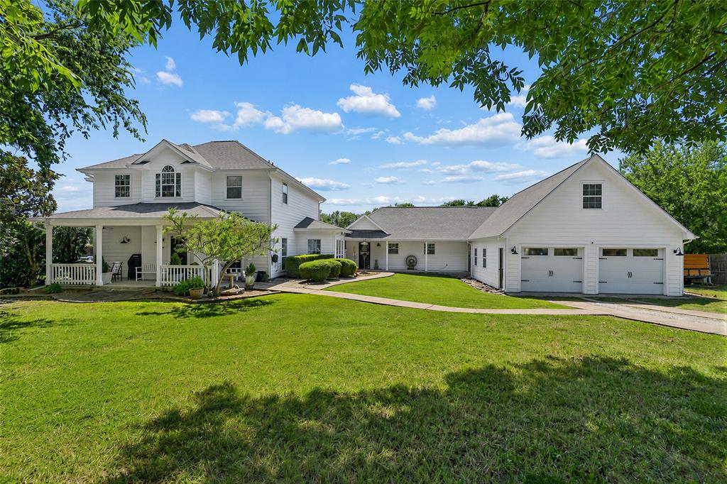 4030 Weston Road McKinney, TX 75071 - Photo 2 of 39 Front of home faces east.